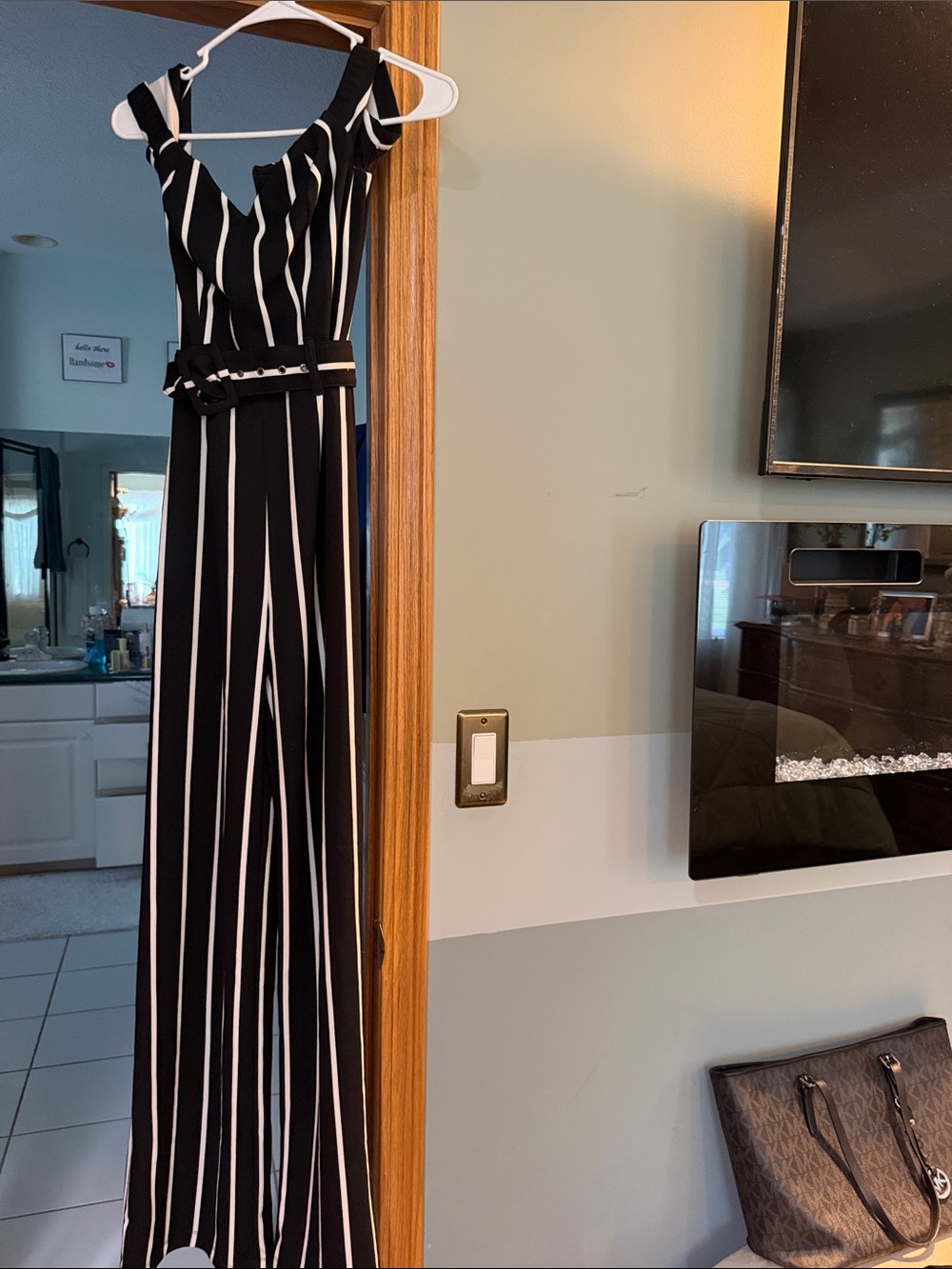 Sleeveless Black & White Vertical-Stripe Wide-Leg Jumpsuit